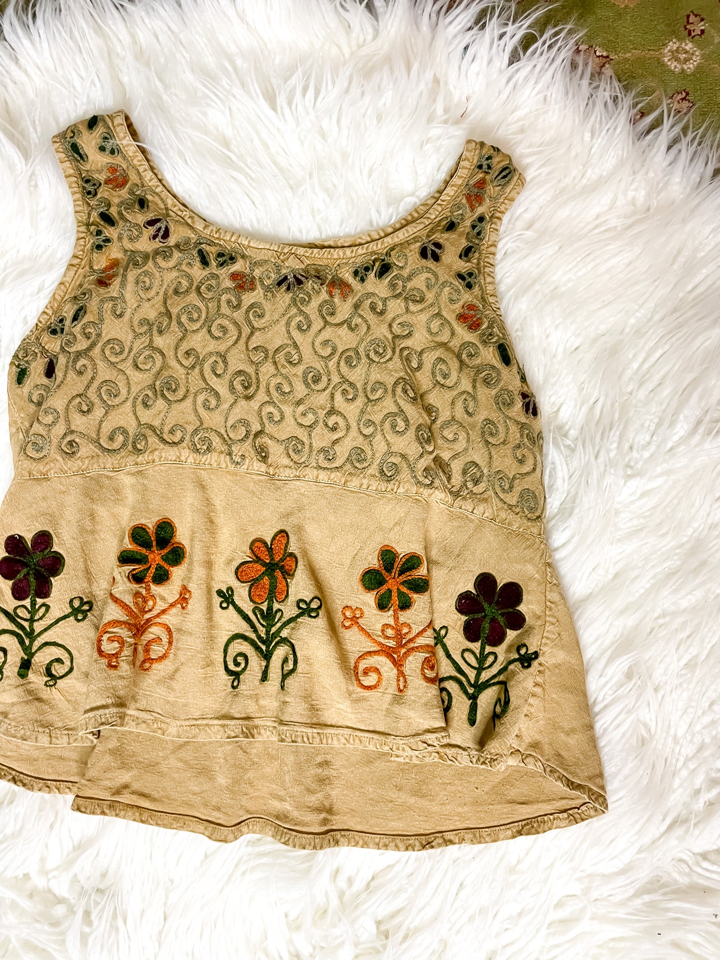 EMBROIDERED PEPLUM TANK